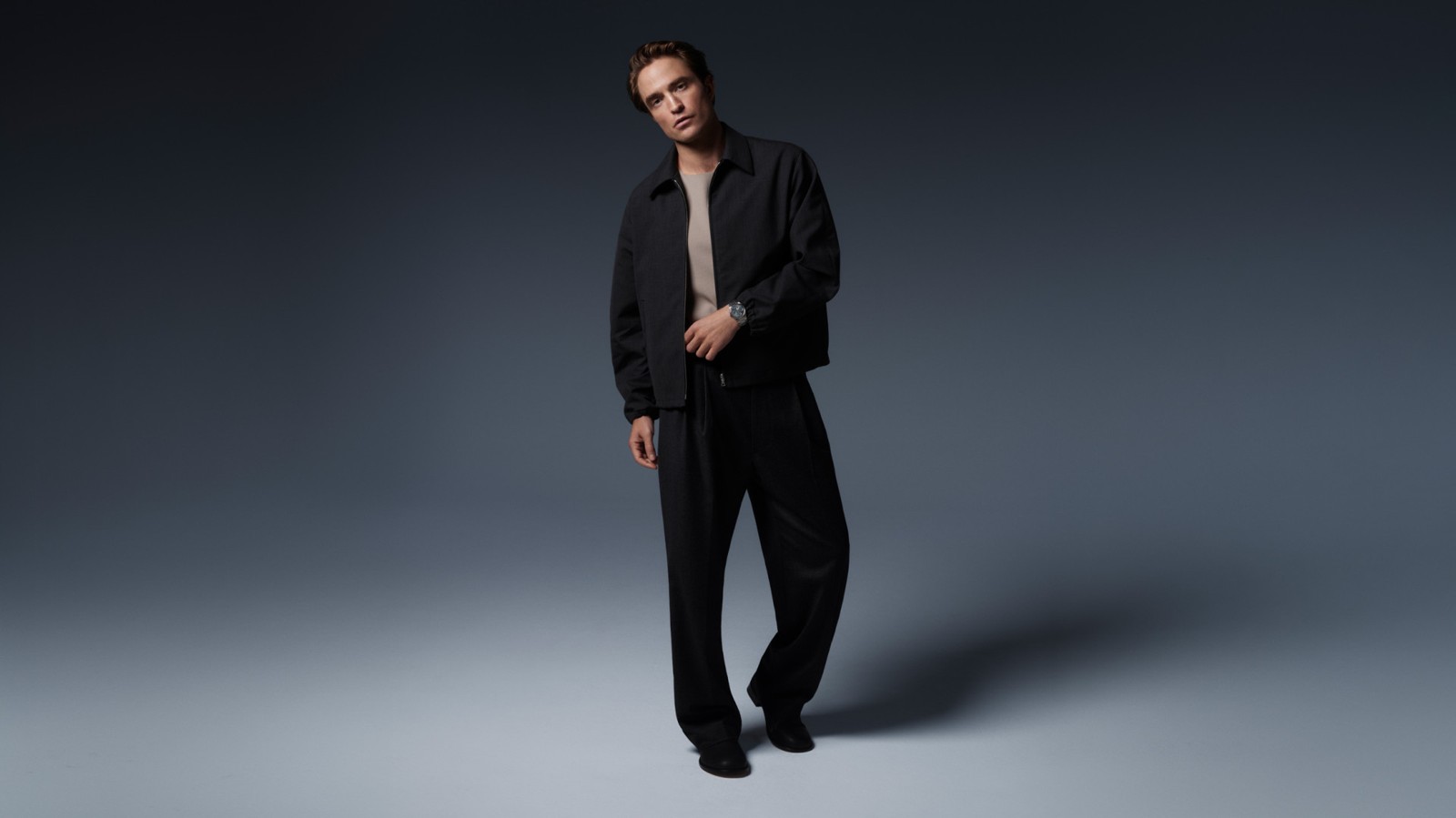 Robert Pattinson wearing a Jaeger-LeCoultre watch in an official ambassador portrait