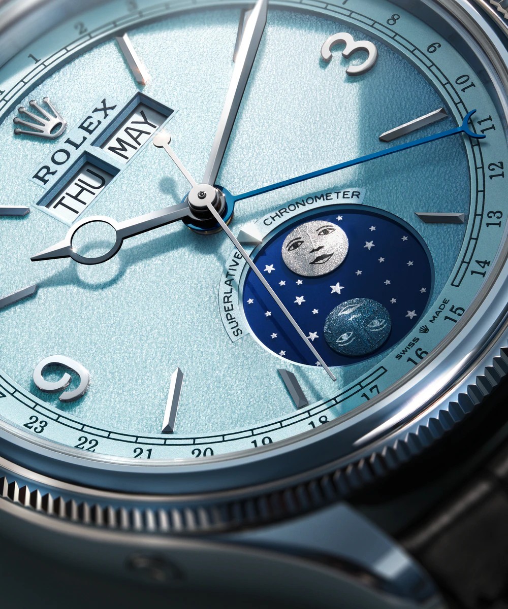 Close view of the platinum Rolex Perpetual Padellone with an ice-blue calendar dial