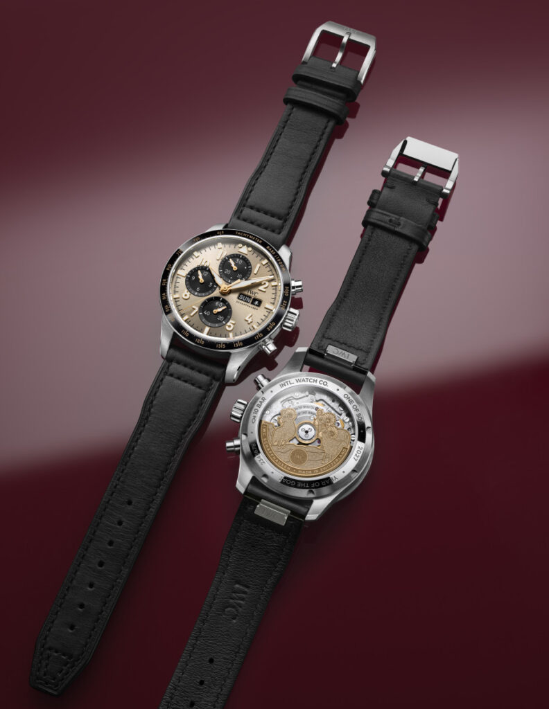 Front and back of the IWC Year of the Goat chronograph IW388310 against a burgundy background