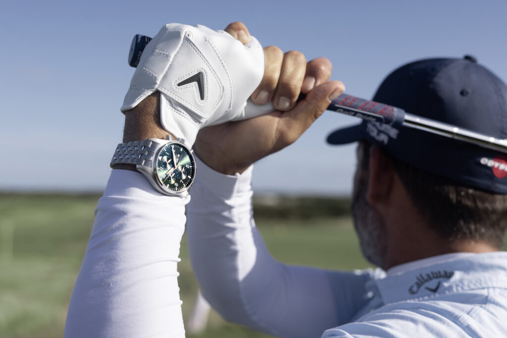 Olive-green IWC Pilot’s Watch Chronograph on a golfer’s wrist in IWC’s Dunhill Links press photography